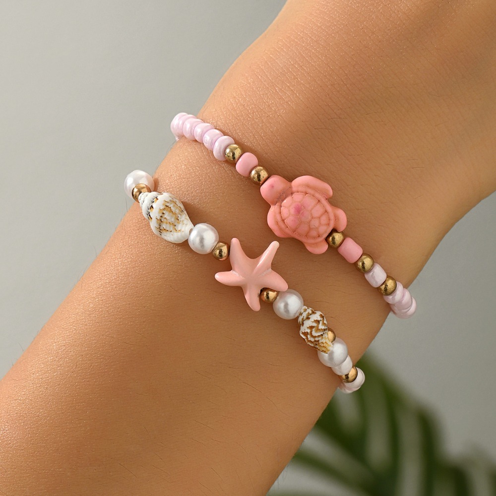 Jewelry Making Kits For Girls - ชุดกำไลข้อมือยืดหยุ่นลายเต่า ปลาดาว และเปลือกหอย ประดับด้วยลูกปัดเซรามิกสีชมพูหวานน่ารัก 2 ชิ้น